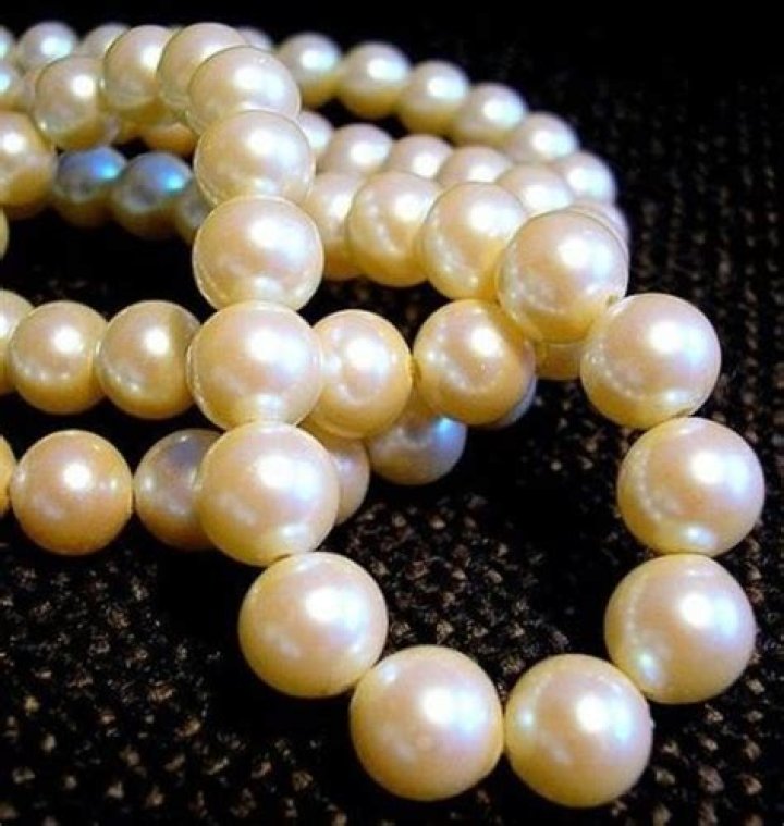 Are real pearls heavier than fake pearls?