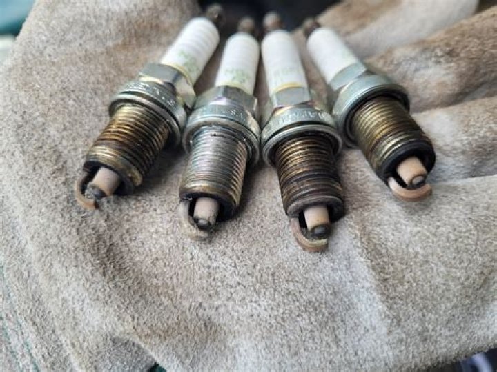Can bad spark plugs cause a gas smell?