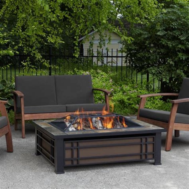 Can you burn freshly cut wood in a fire pit?