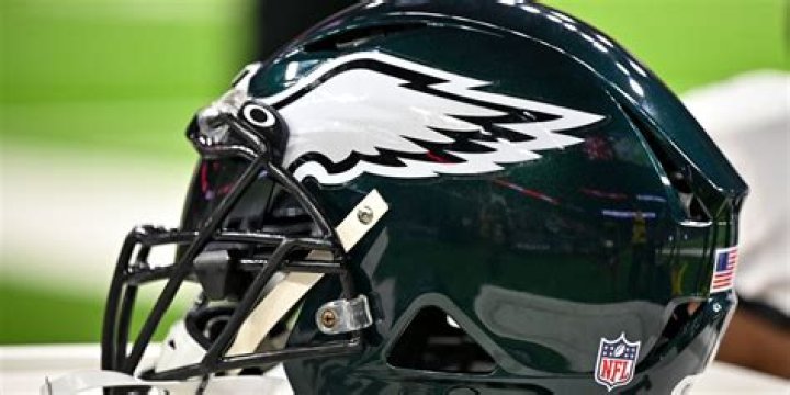 Do NFL players have speakers in helmets?