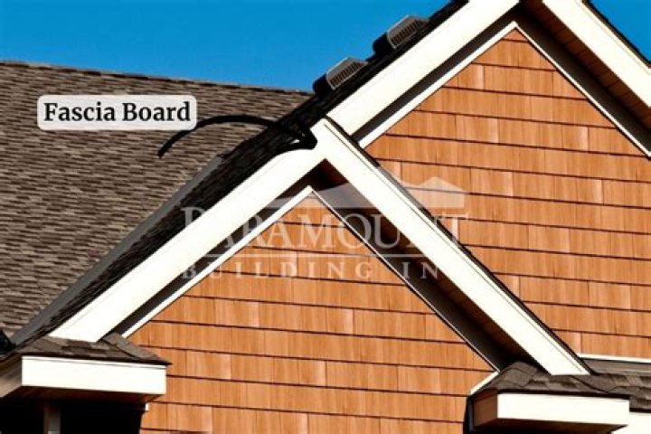 Does fascia board go on before roof sheathing?