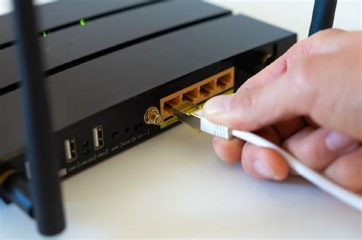 How do I add a second router to upstairs?