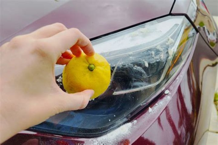 How do I clean the outside headlights on my car?