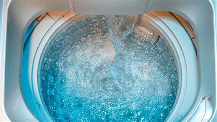 How do I get the particles out of my washing machine?