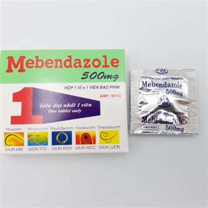 How do you take mebendazole 500 mg?