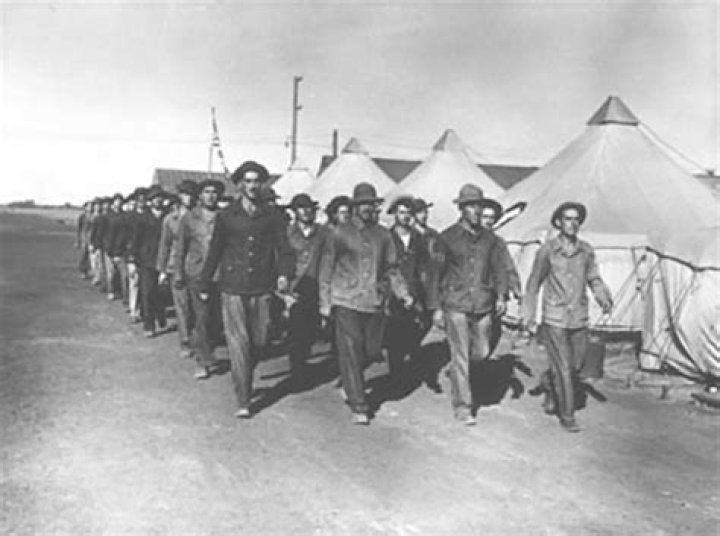 How many men survived the march to the POW camp?