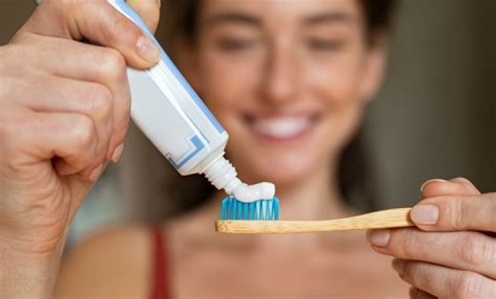 Is brushing without toothpaste OK?