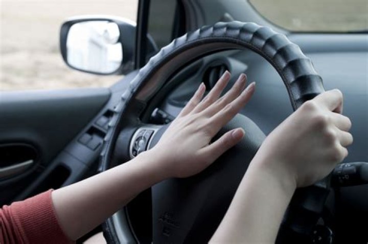 Is it illegal to honk your horn WA?