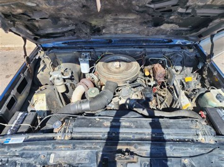 Is it safe to power wash a car engine?