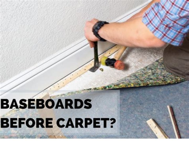 Should carpet or baseboards be installed first?