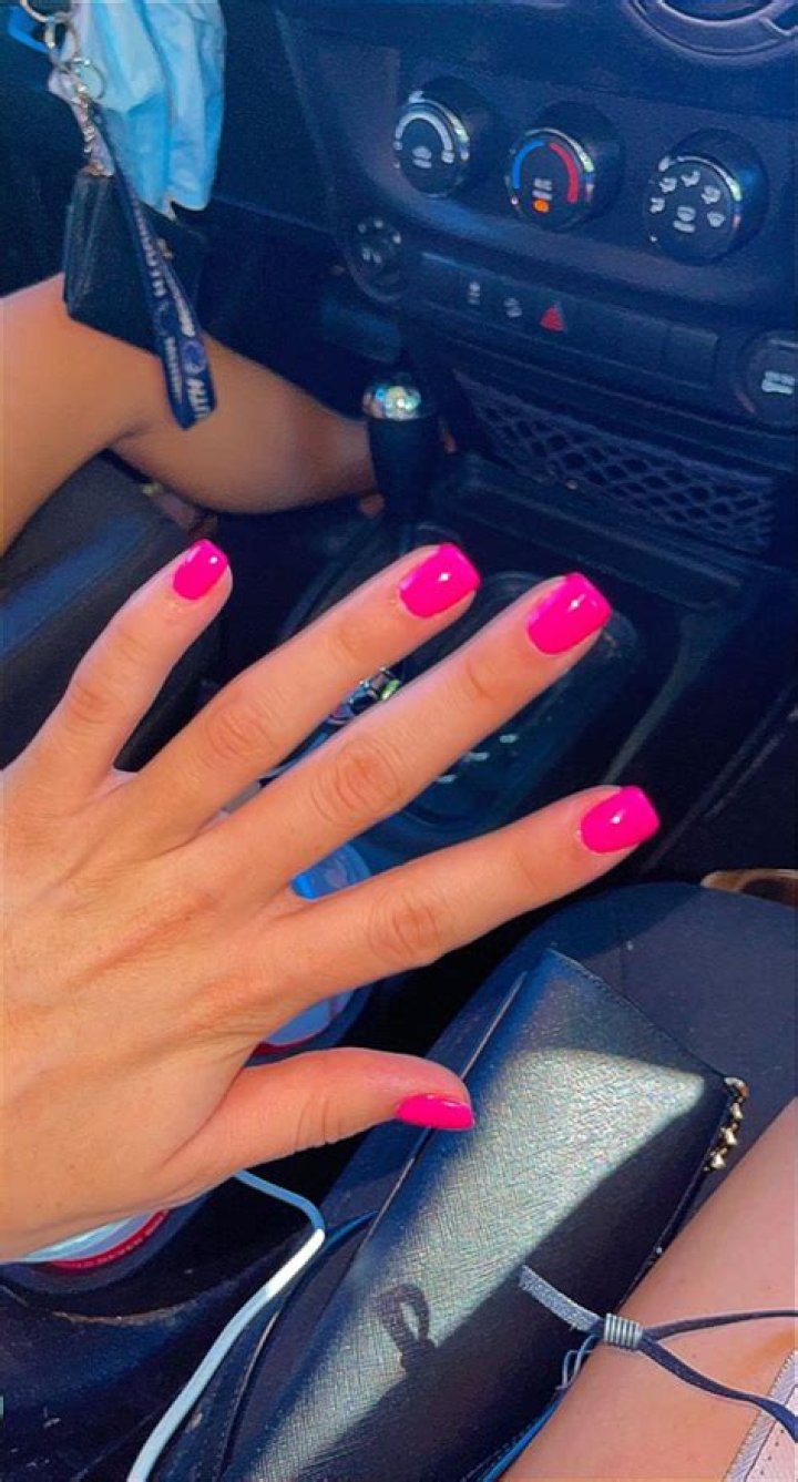 What do hot pink nails mean on a girl?