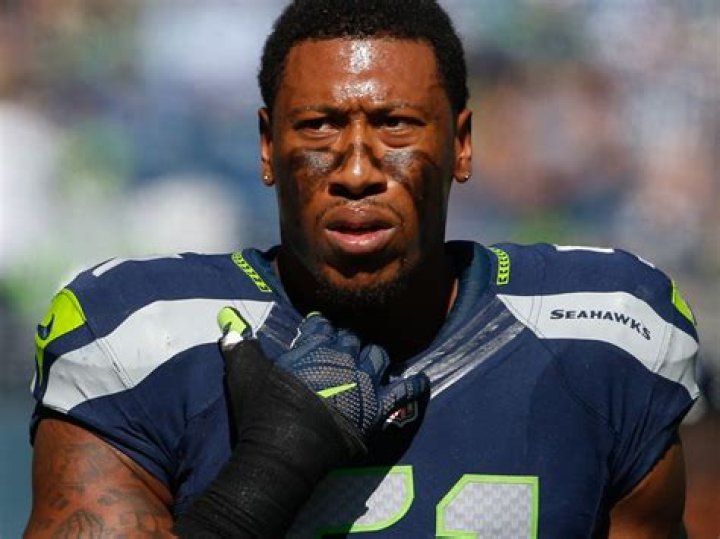 What does the cross on football players face mean?