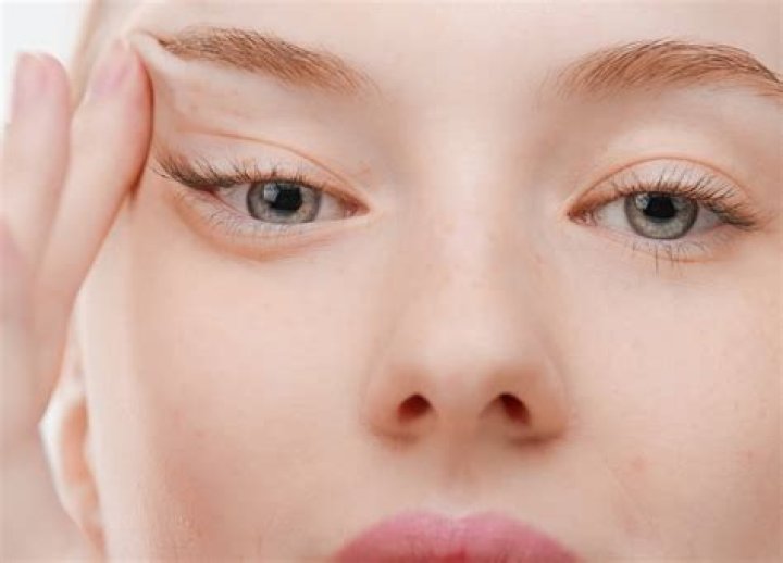 What is it called when you push your eyebrows together?