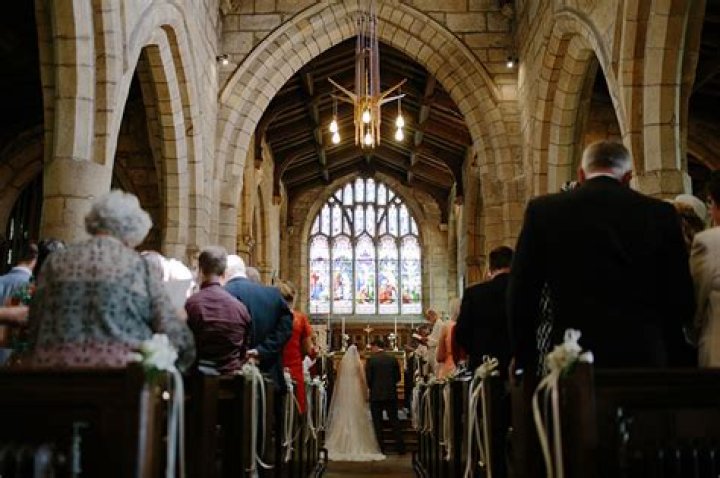 Where do the parents of the bride sit?