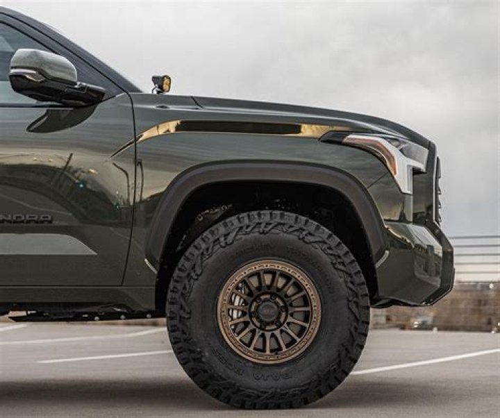 Where do you put 2 new tires on a car?