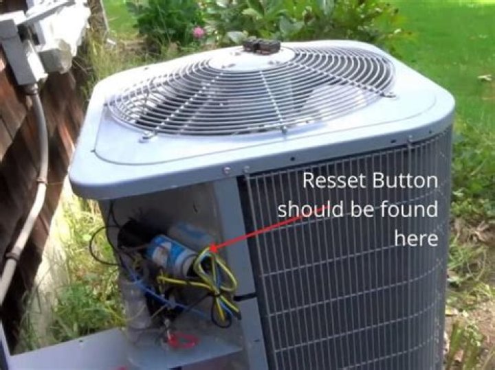 Where is AC reset button?