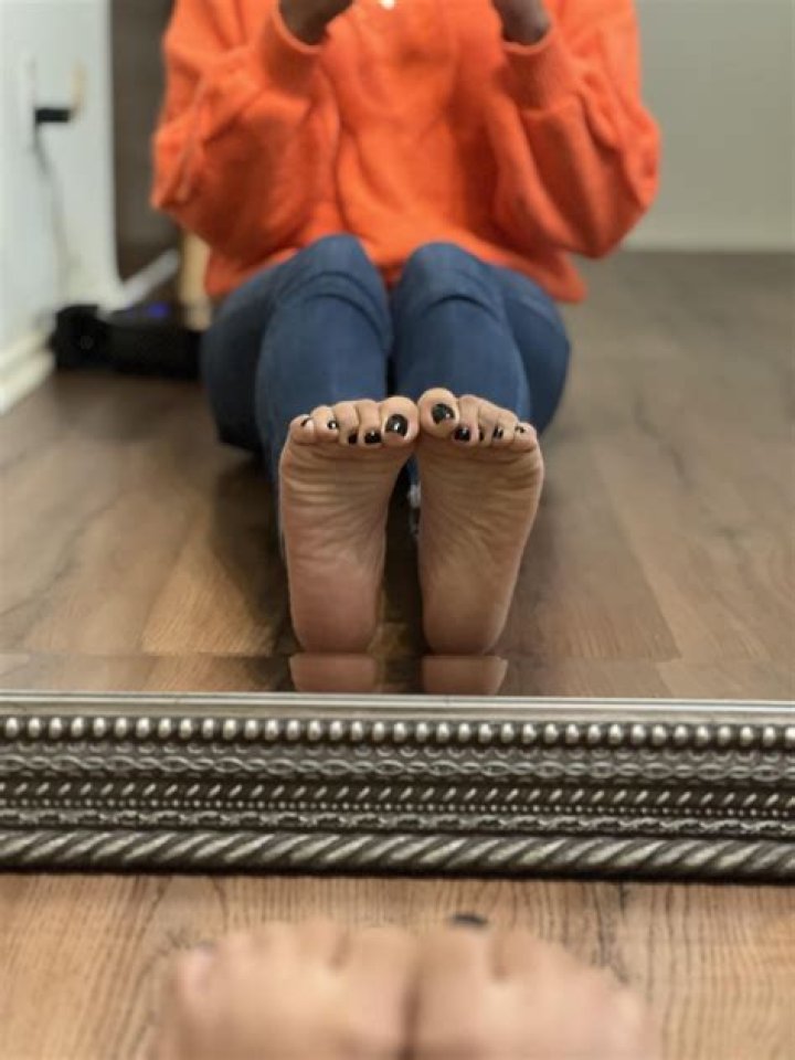 Why can I see my feet in the mirror?