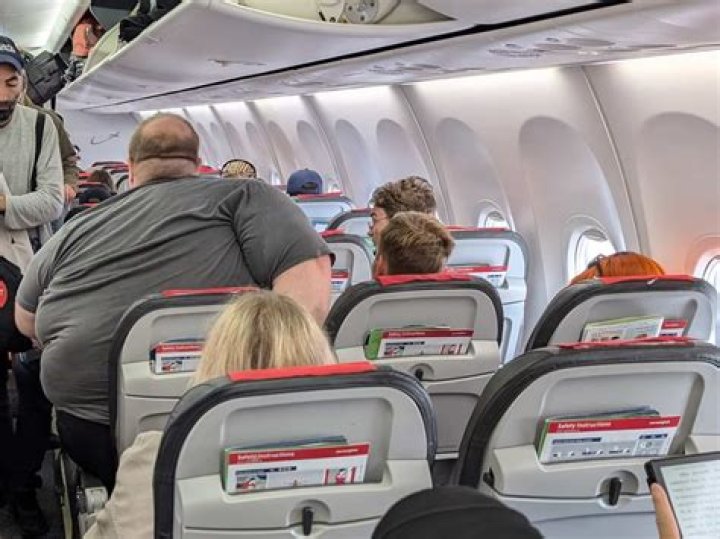 Why do airlines bump passengers?