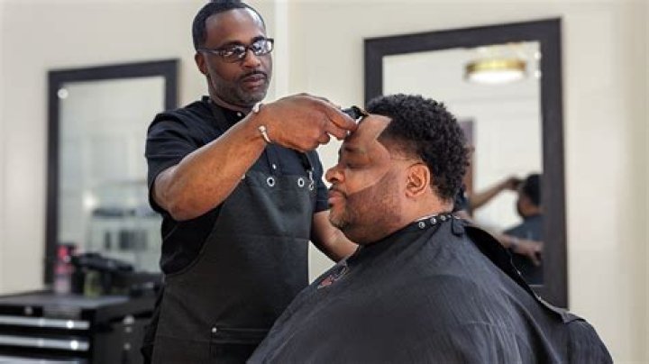 Why do barbers put that white thing on your neck?