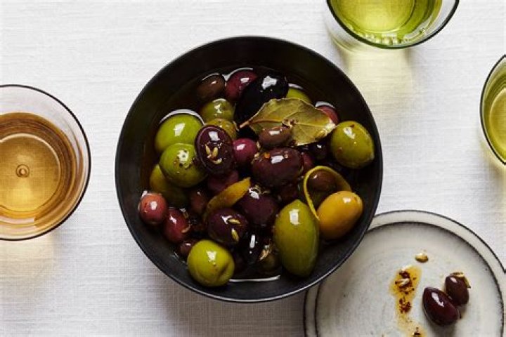 Why do Greeks love olives?