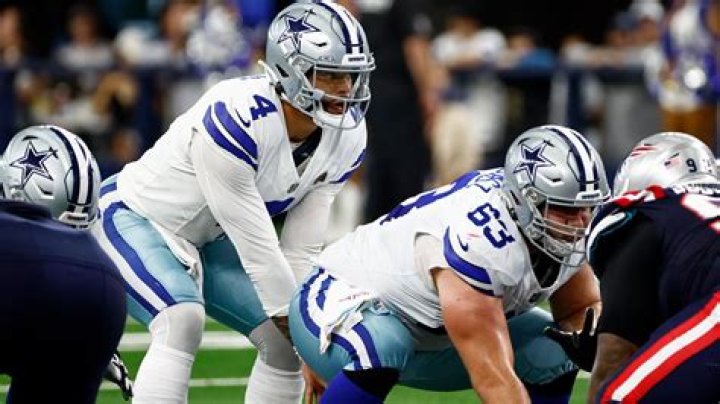 Why do the Dallas Cowboys have red white and blue on their helmets?