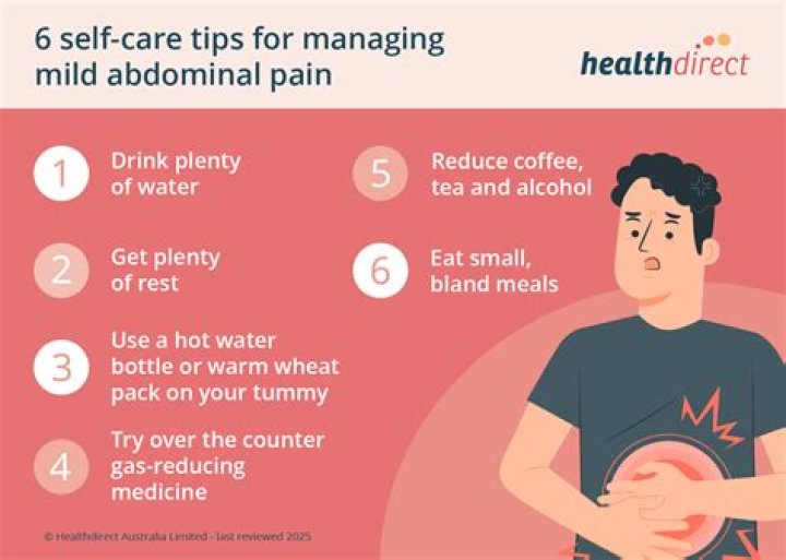 Why does my stomach hurt in between my ribs?