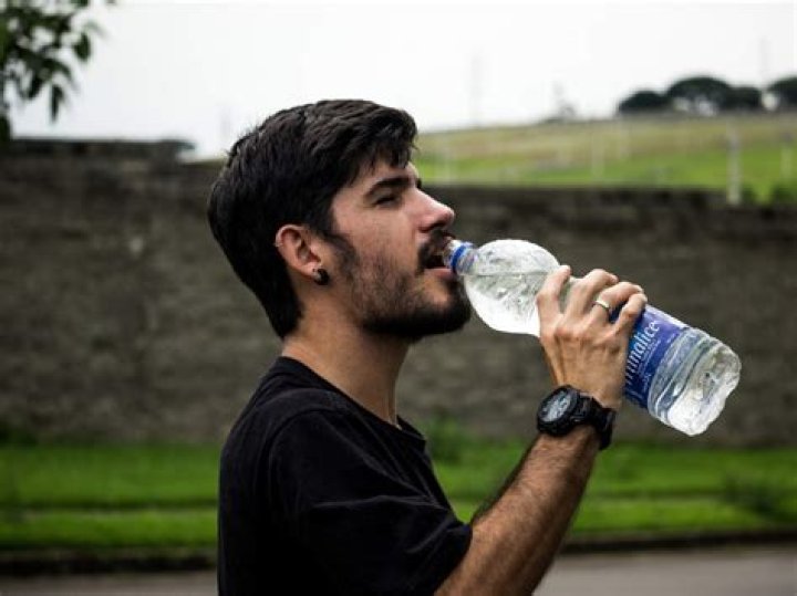 Why one should not drink water while standing?