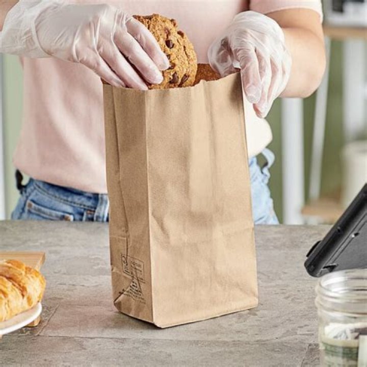 Will a brown paper bag keep carpenter bees away?